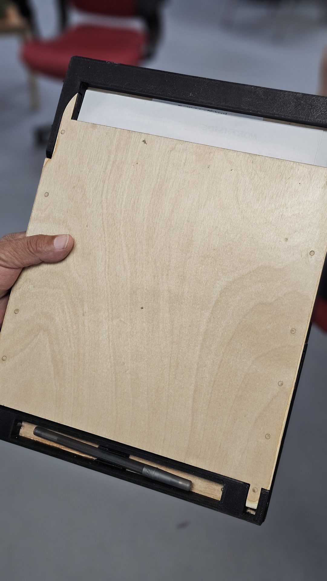 Back panel of DeskDrive Pro showing the built-in pen storage